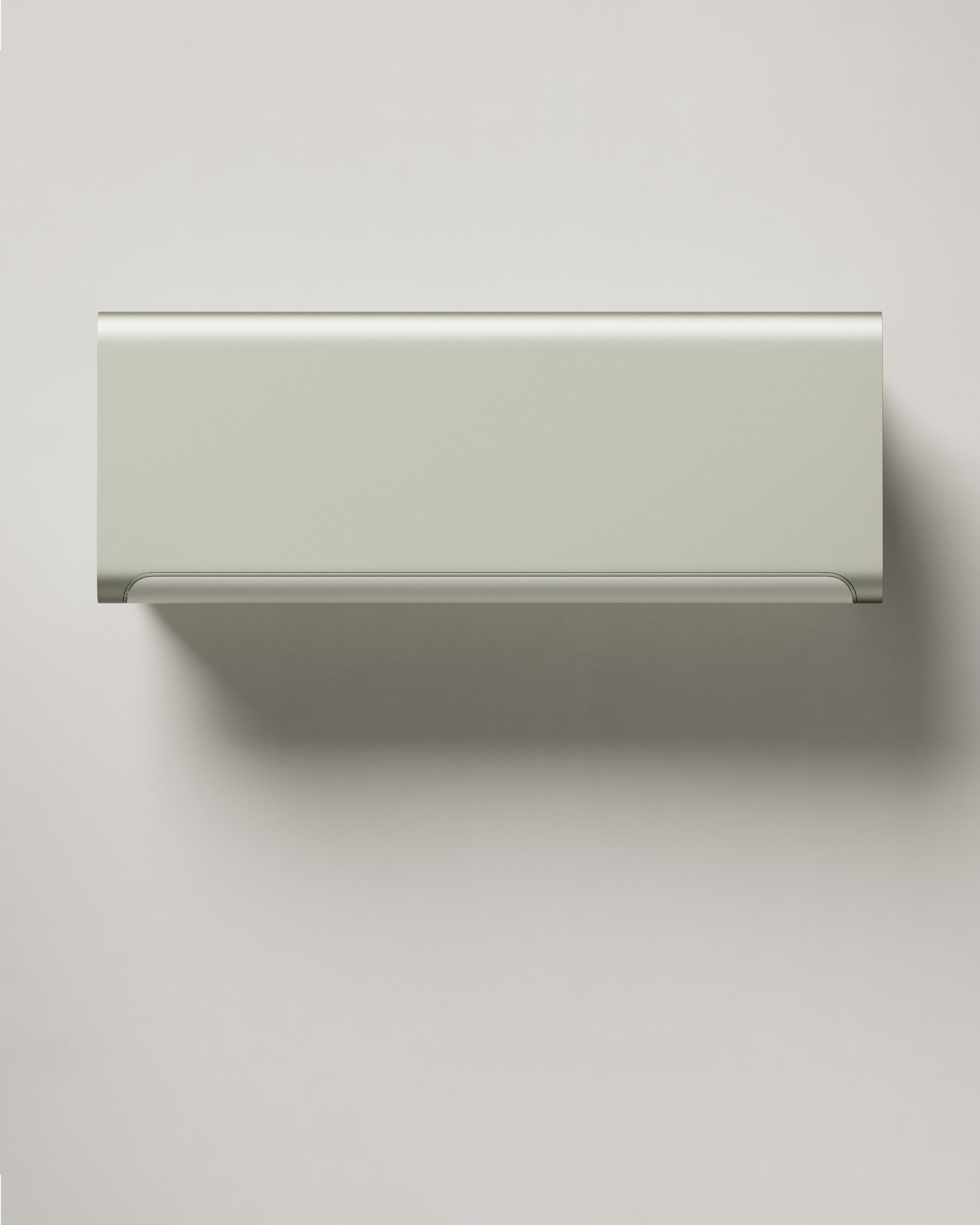 Front view of a light grey rectangular air conditioner mounted on a plain wall.