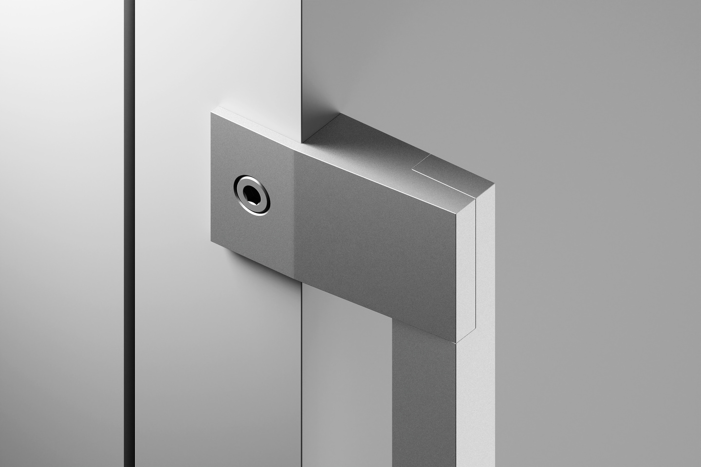 Close-up view of a metallic appliance door handle mounted on a grey cabinet panel