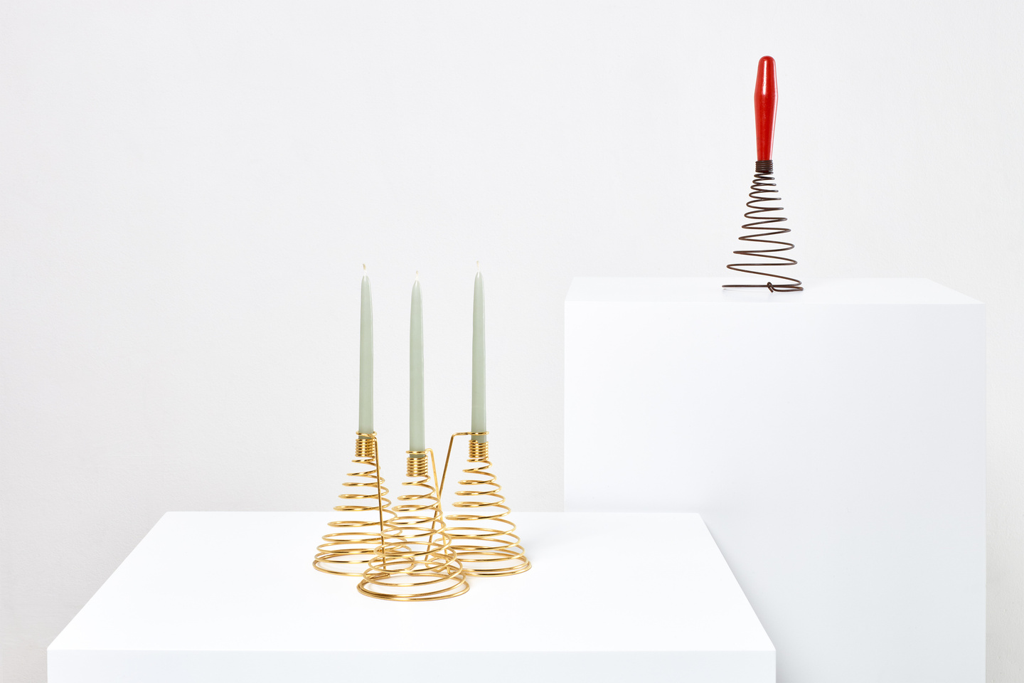 Prototype items presented on low white pedestals