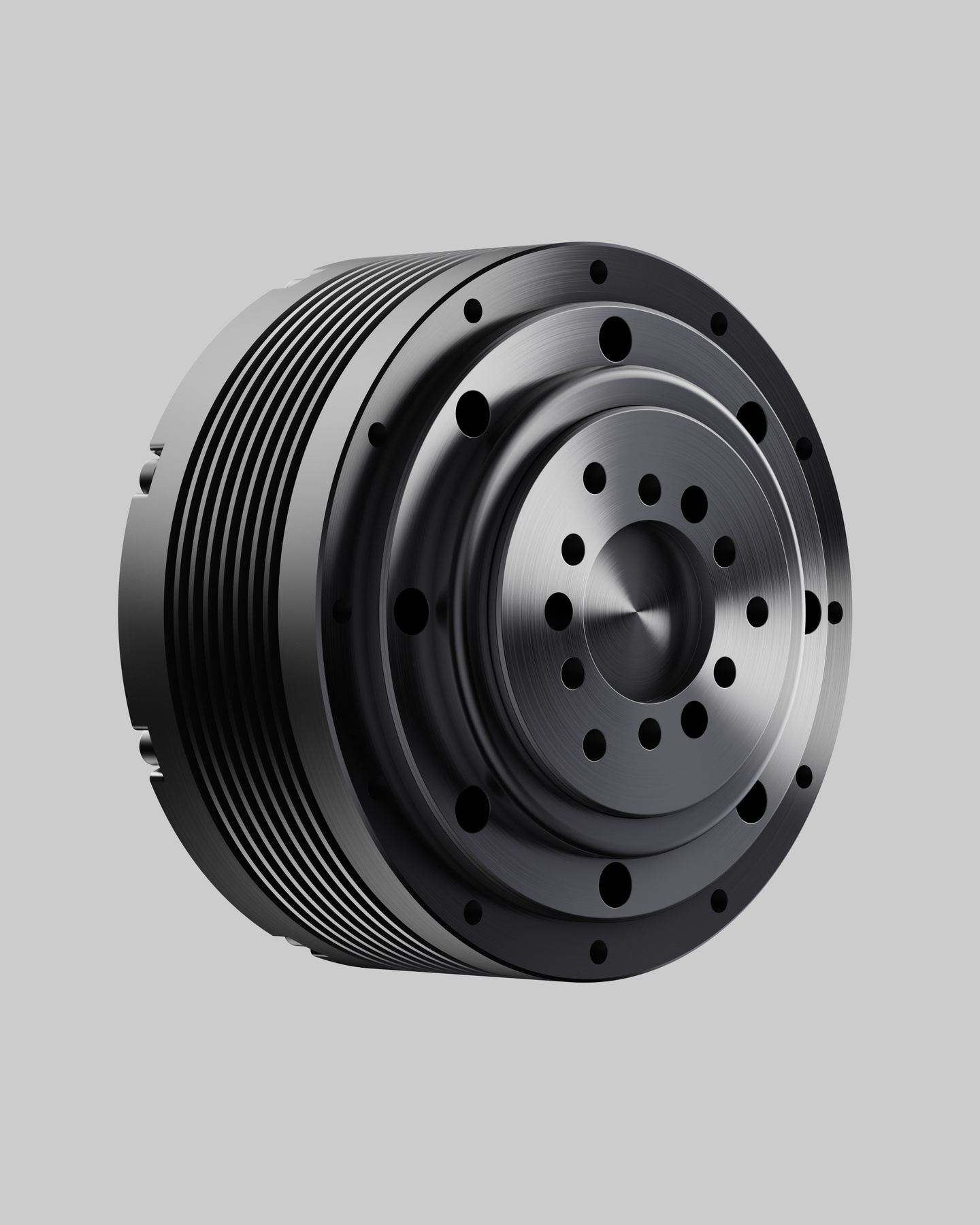 Black cylindrical mechanical motor component with bolt holes on top