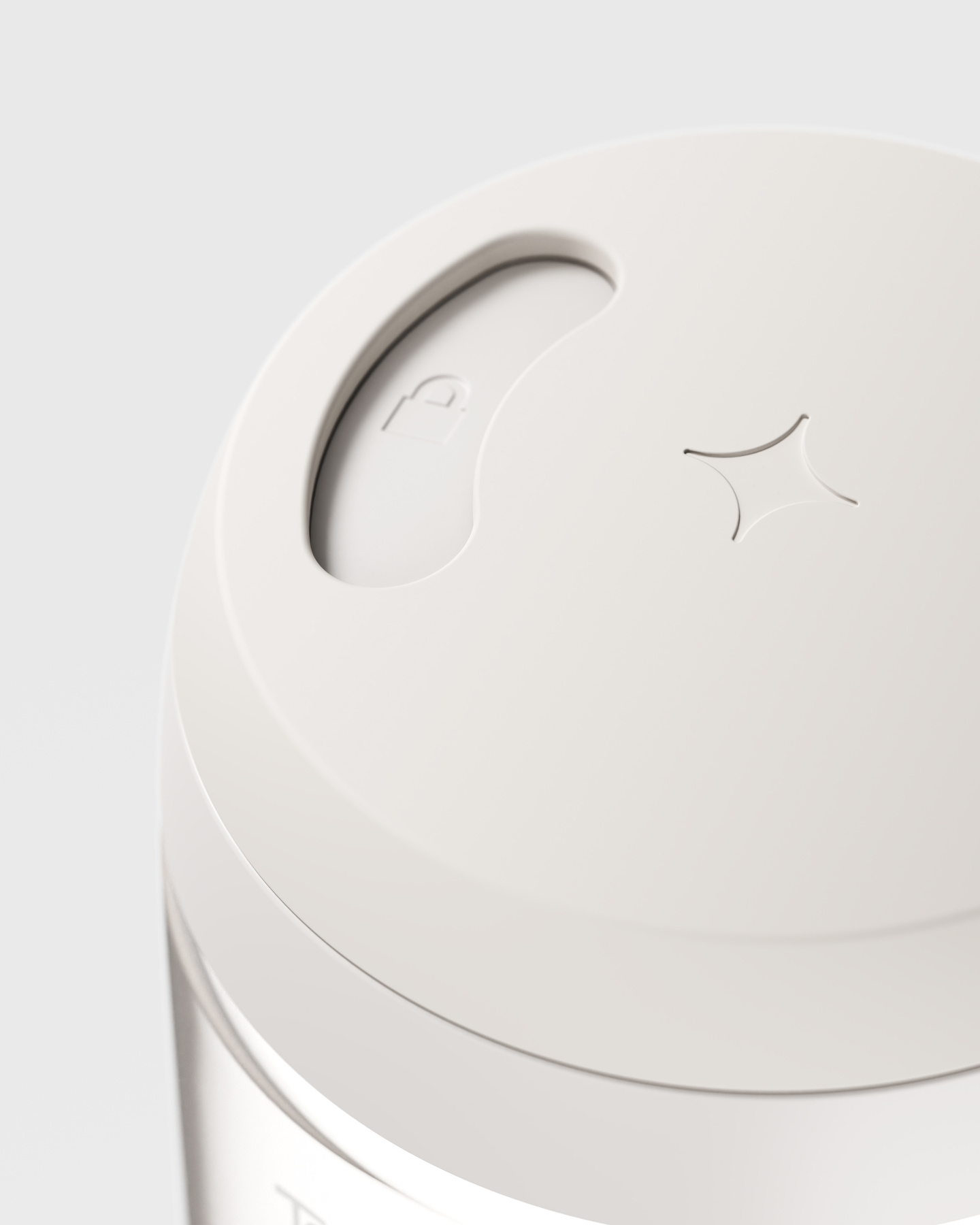 Close-up angle view of a white cup lid with sliding closure
