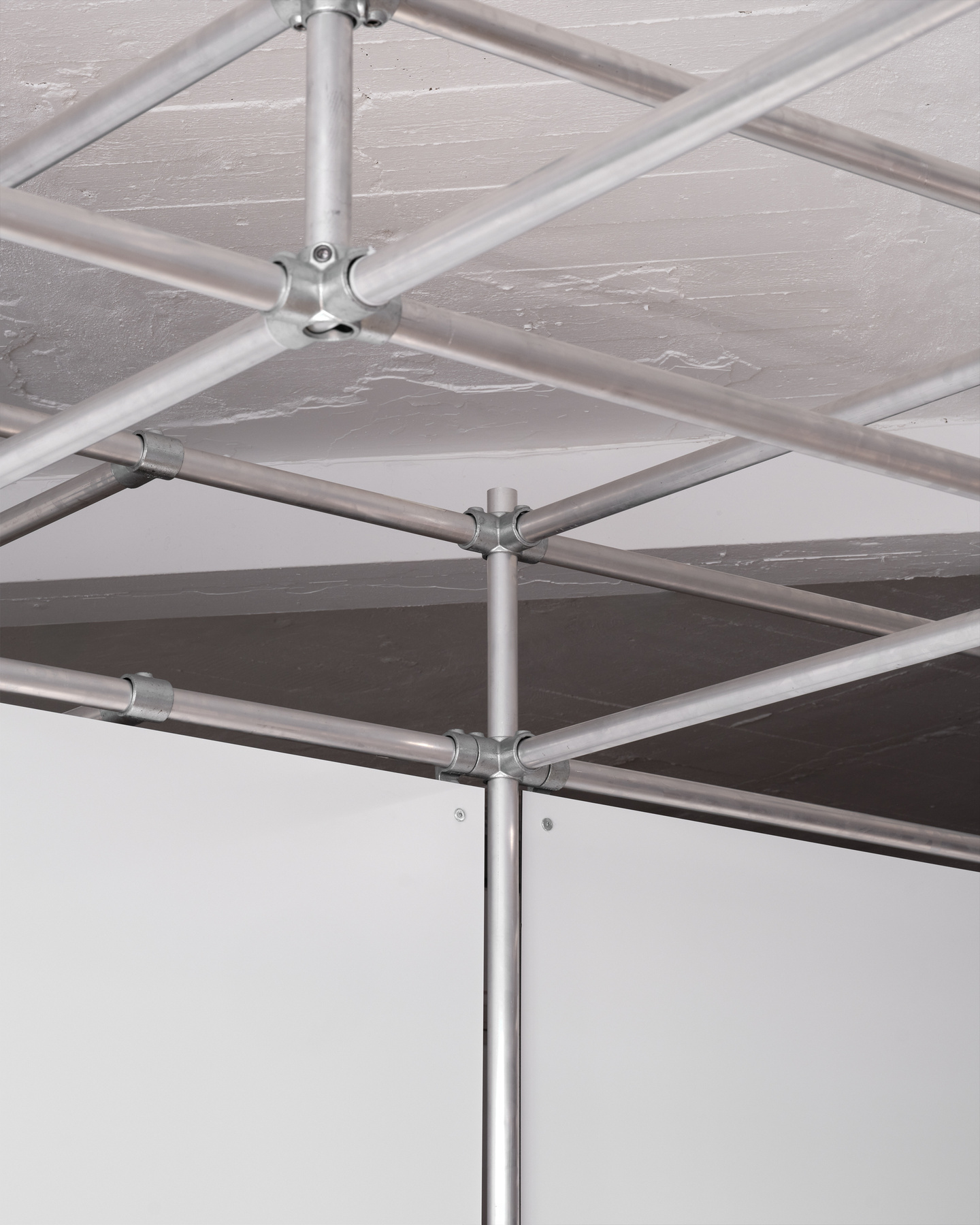 Upward view of exhibition scaffold structure ceiling