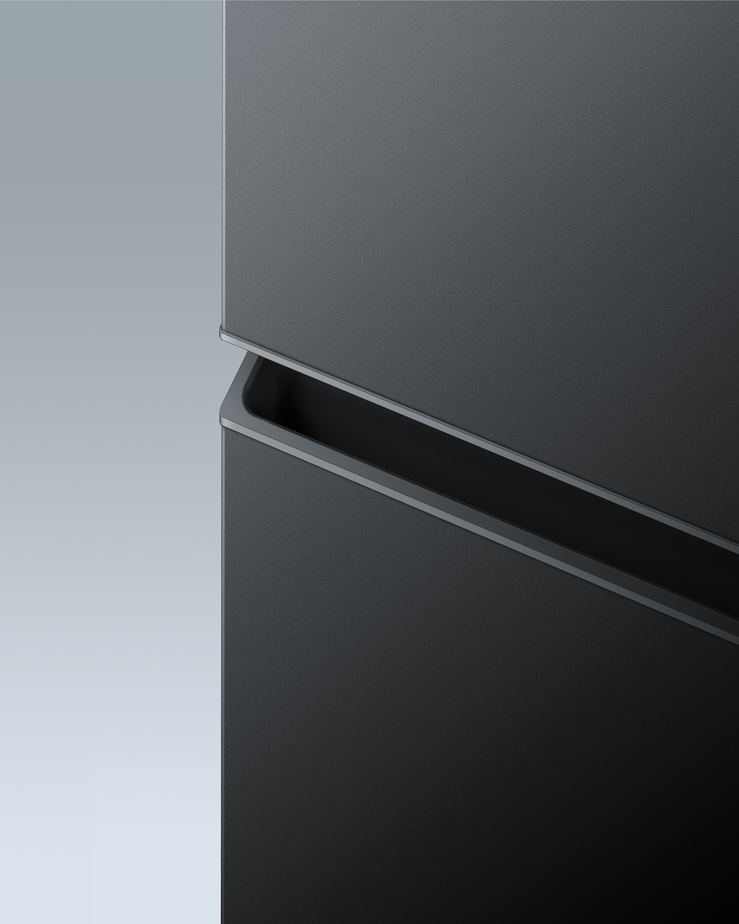 Corner detail view of a black refrigerator door handle integrated profile