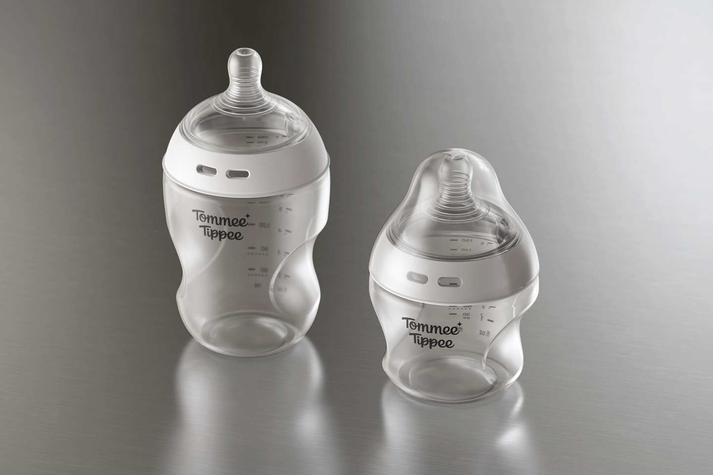 Clear baby bottle body and silicone teat displayed separately