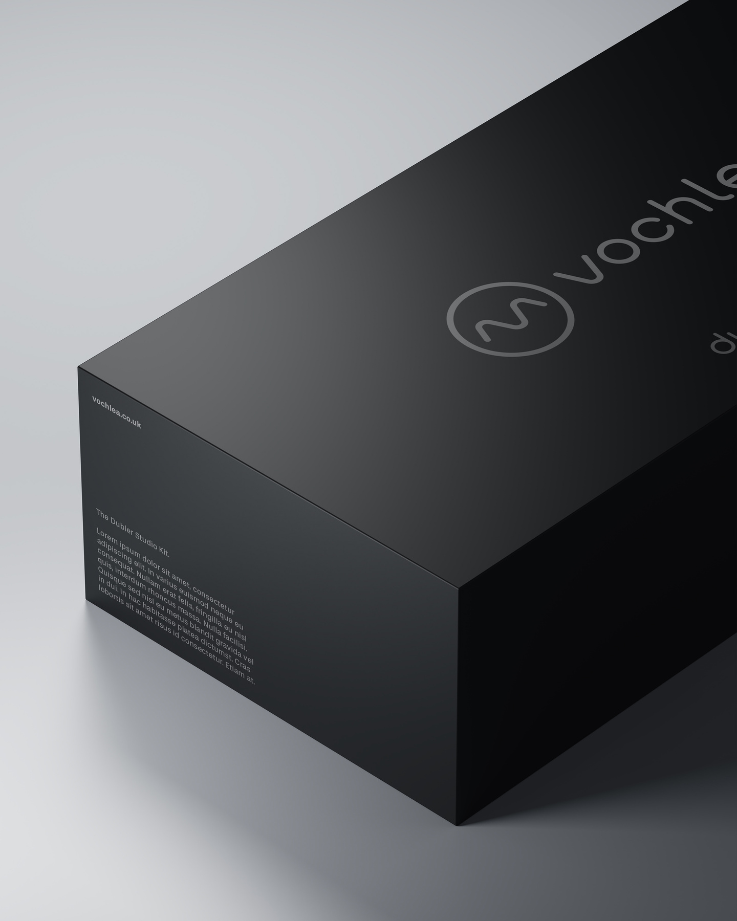 Matte black rectangular box featuring the Vochlea logo and subtle printed text on top