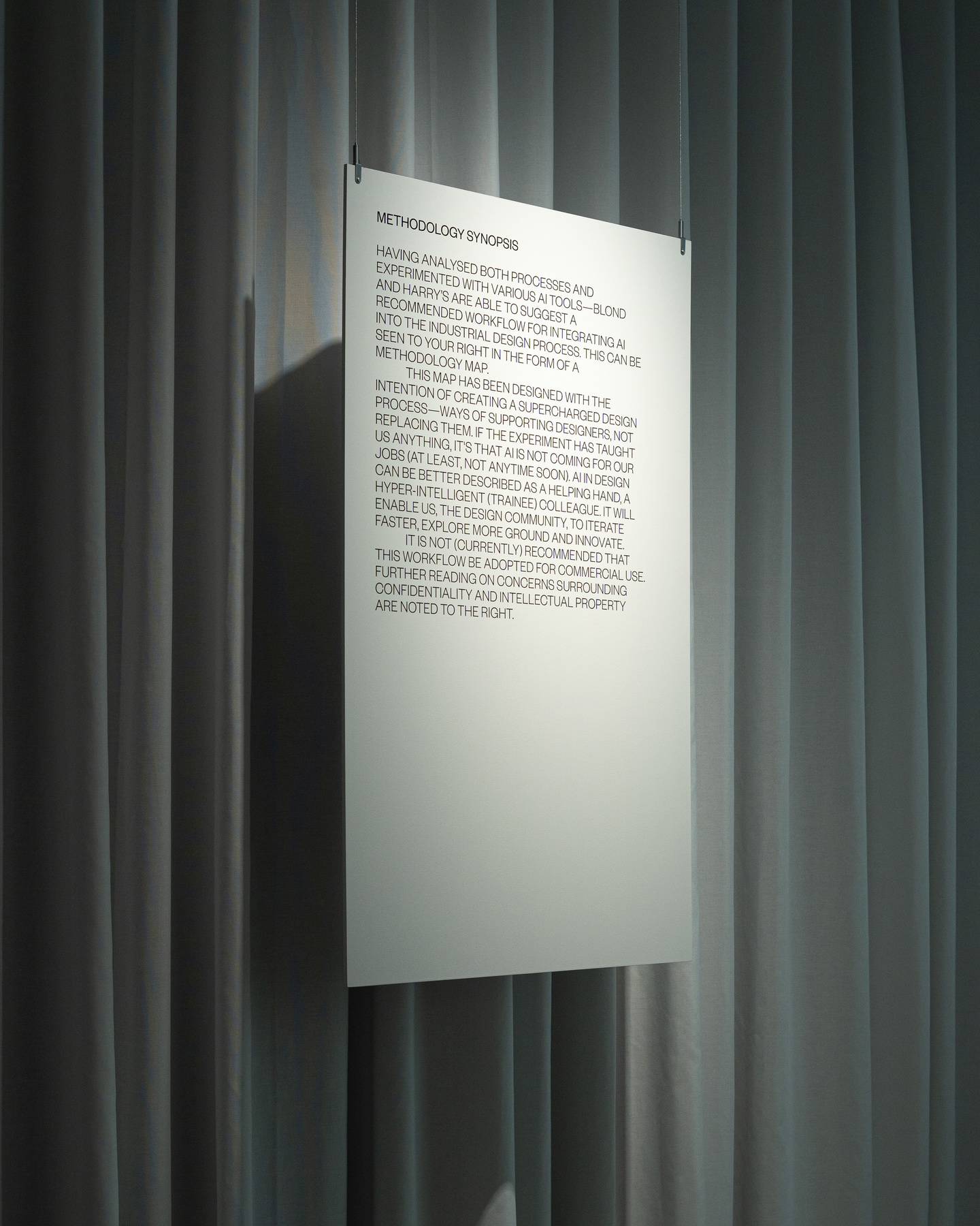 Copy on a suspended panel displayed during Milan Design Week exhibition DOUBLE VISION