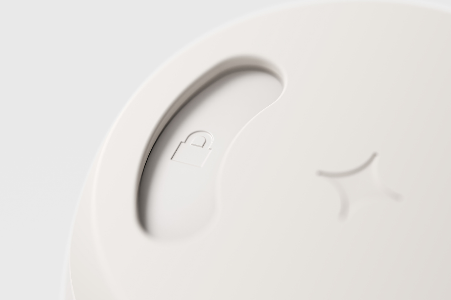 Close-up detail of a white lid sliding closure mechanism