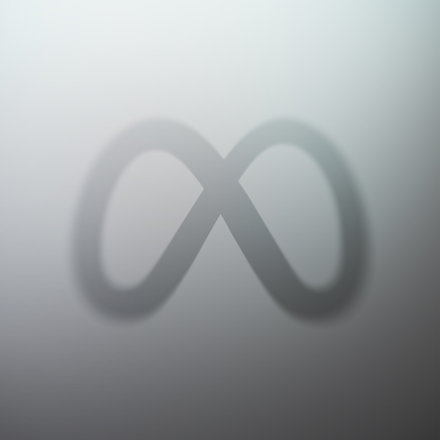 Logo outline embossed on a smooth dark grey matte surface