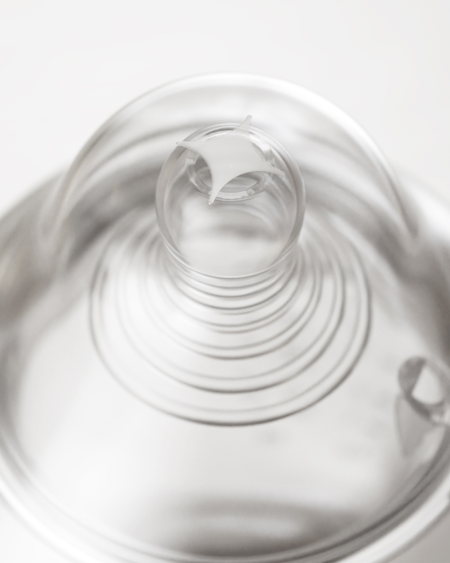 Close-up of a clear silicone baby bottle teat