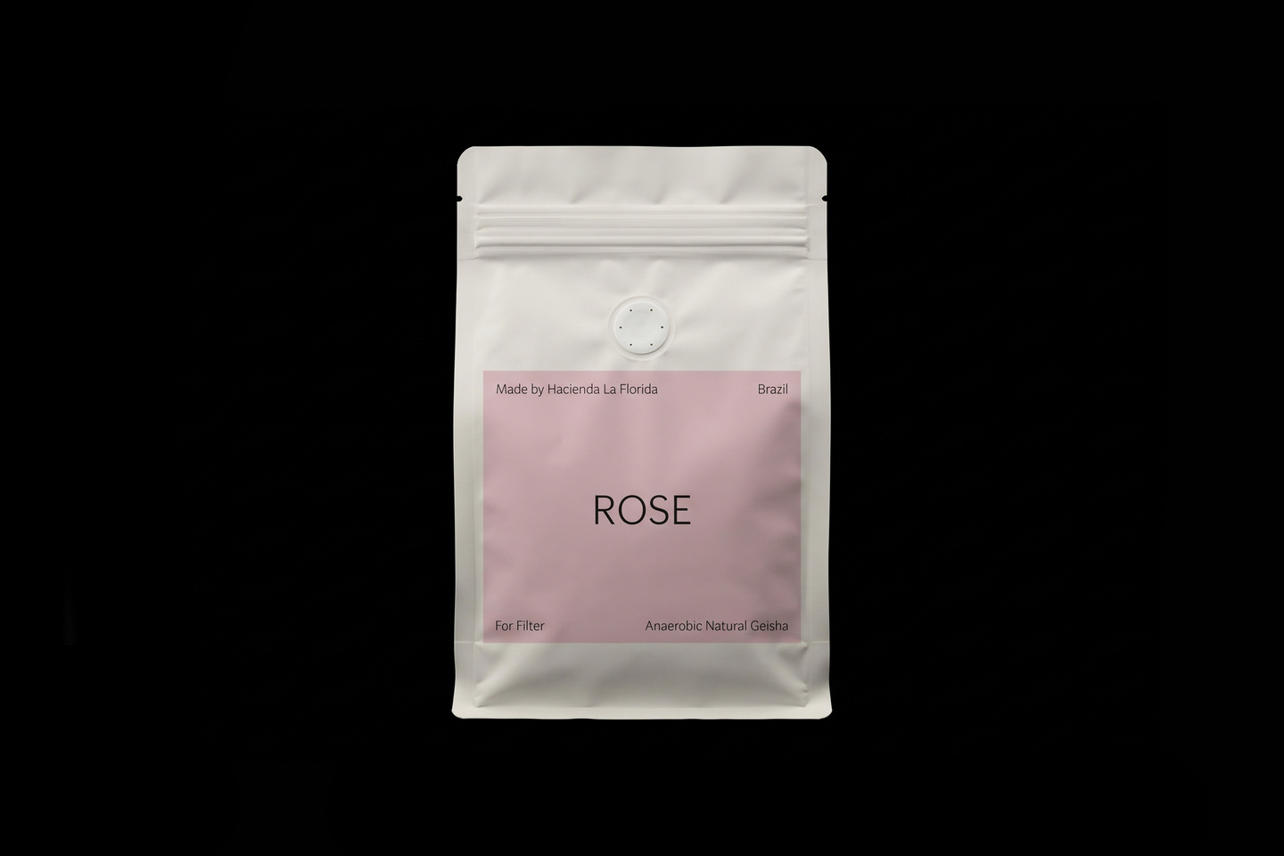 White sealed pouch packaging featuring a light pink rectangular label printed with the text ROSE.
