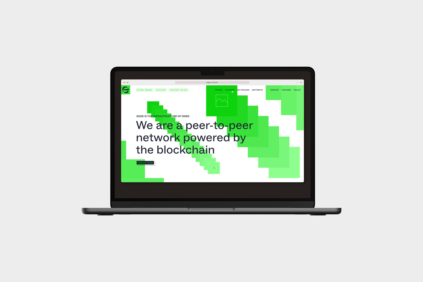 Laptop screen displaying a green graphic web design layout