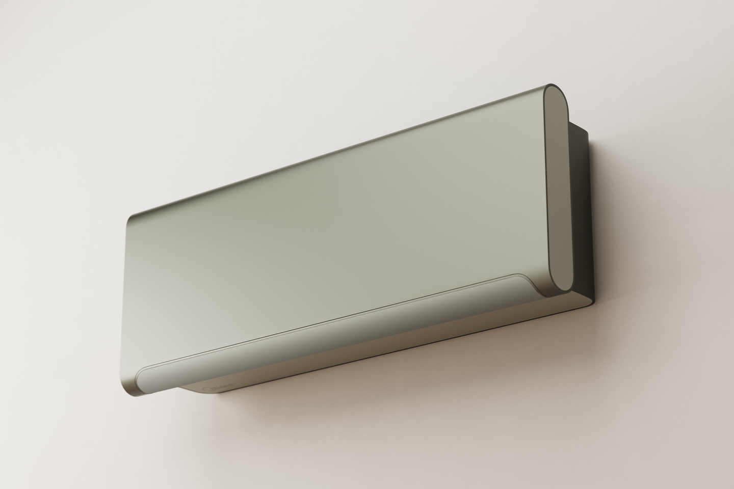 Angled perspective view of a metallic air conditioner unit mounted on a light wall.